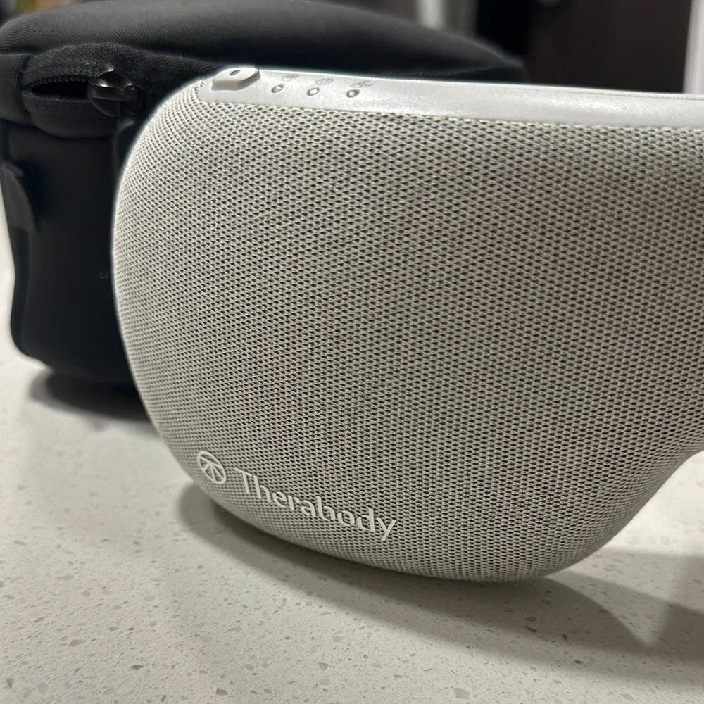 Therabody Gray and Black smart goggles